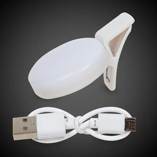 Round white clip-on LED light with 150mAh battery and three flash... from ASI 42016 Brighter Promotions Inc
