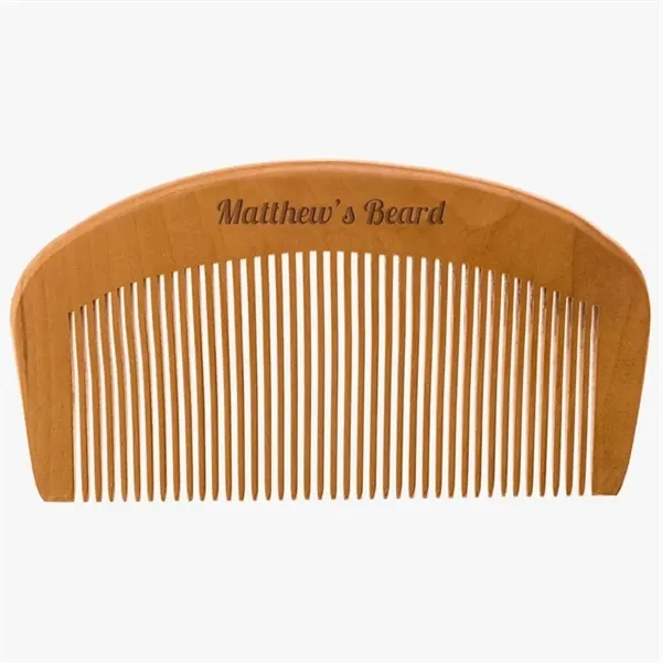 Handcrafted small wooden comb with fine teeth, curved top, and smooth... from ASI 73010 Natico Originals Inc