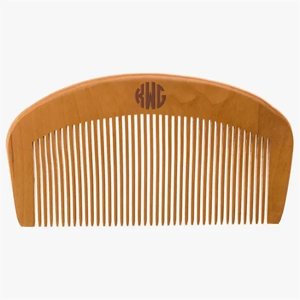Handcrafted small wooden comb with fine teeth, curved top, and smooth... from ASI 73010 Natico Originals Inc
