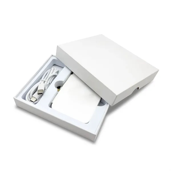 A slim and compact MagSafe travel charger.... from ASI 91435 Tomax USA / Tomax