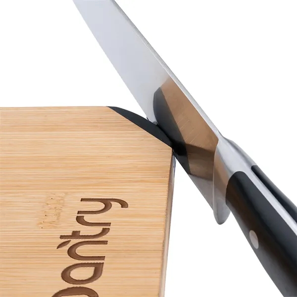This large bamboo cutting board comes with a metal handle and... from ASI 68507 The Magnet Group / Innovations by Magnet™