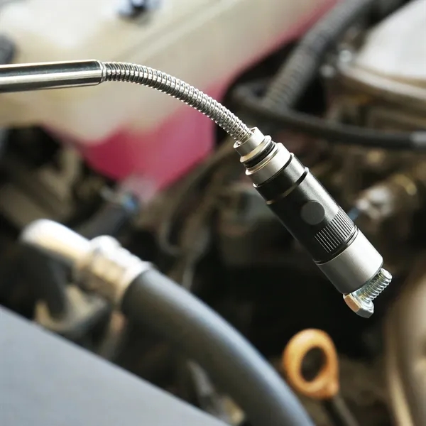 Rechargeable telescopic work light with magnetic end and barrel.... from ASI 61966 HPG / Beacon Promotions