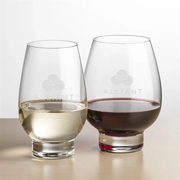 Contemporary Stemless Crystalline Footed Wine with a wide bowl anchored by... from ASI 84592 St Regis Group
