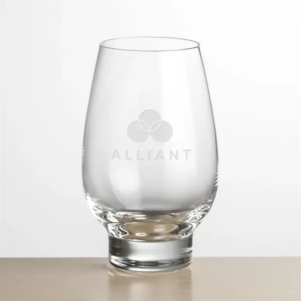 Contemporary Stemless Crystalline Footed Wine with a wide bowl anchored by... from ASI 84592 St Regis Group