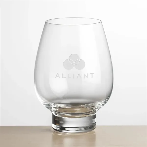 Contemporary Stemless Crystalline Footed Wine with a wide bowl anchored by... from ASI 84592 St Regis Group