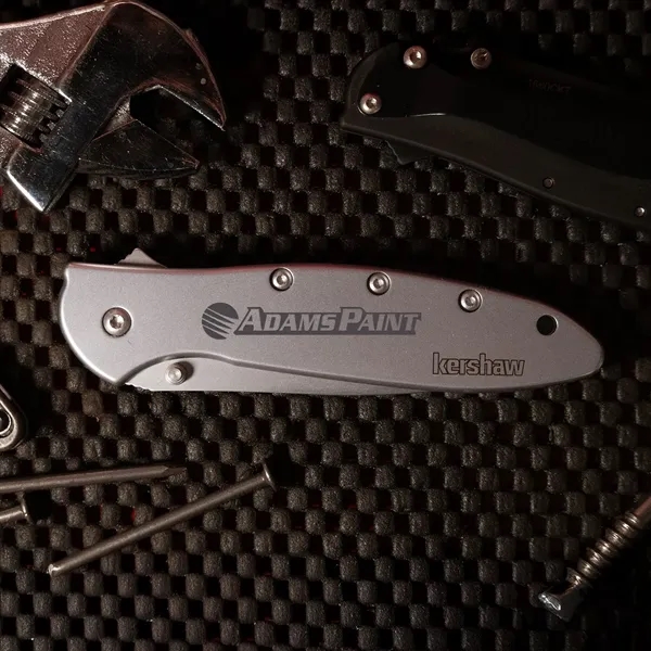 Folding knife with 4" blade and a patented operating system... from ASI 46170 Compass Industries Inc