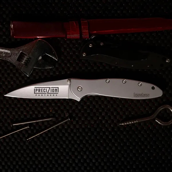 Folding knife with 4" blade and a patented operating system... from ASI 46170 Compass Industries Inc