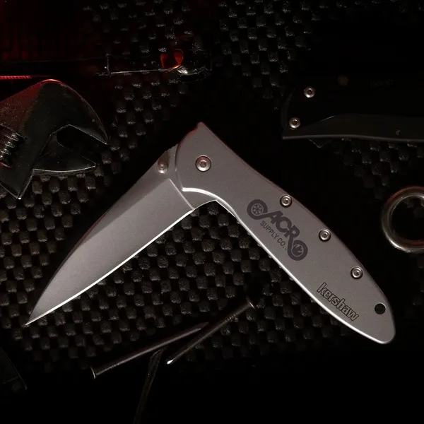 Folding knife with 4" blade and a patented operating system... from ASI 46170 Compass Industries Inc