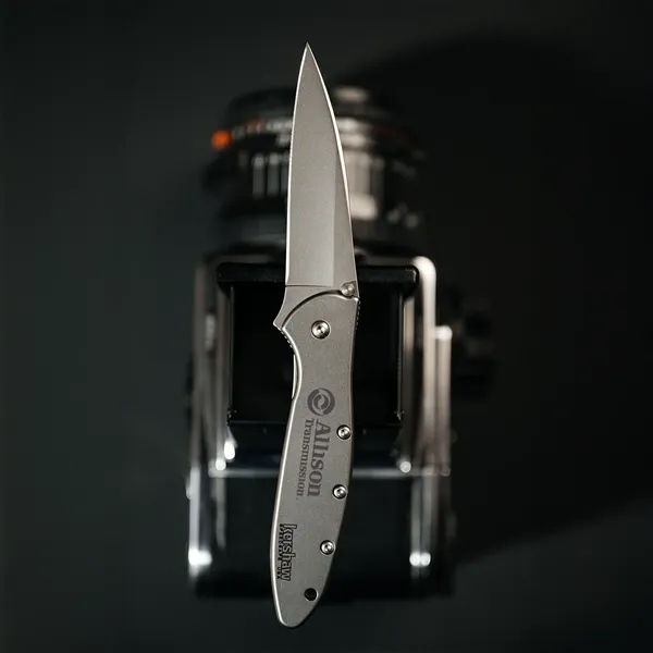 Folding knife with 4" blade and a patented operating system... from ASI 46170 Compass Industries Inc
