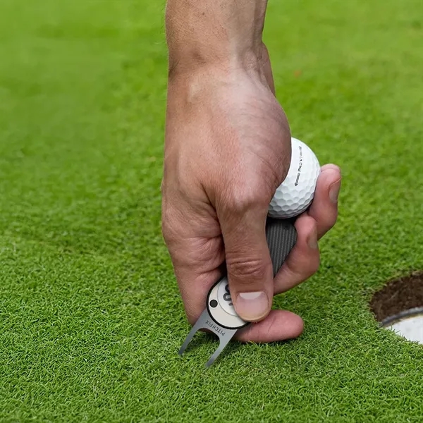 Pitchfix XK golf divot tool with a removable ball marker on... from ASI 38120 Ball Pro / Diversified Quality Kitchenware