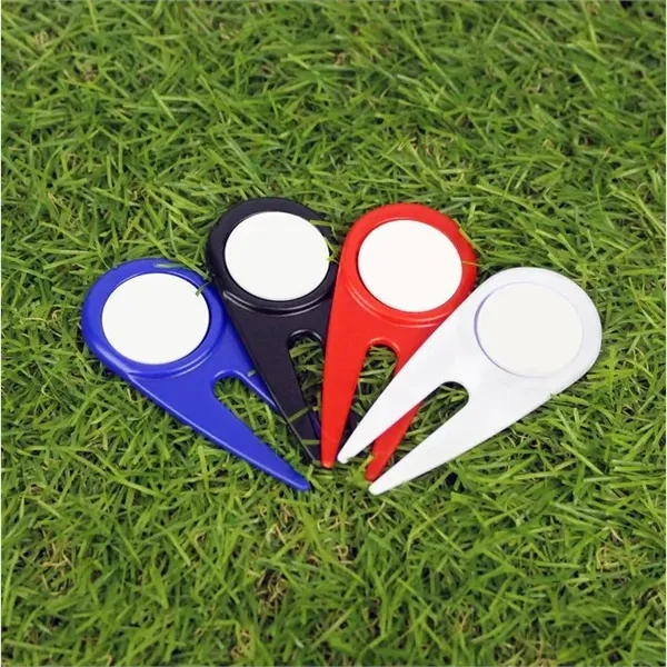 Golf divot with a magnetic ball marker and four tees.... from ASI 57653 Gold Bond