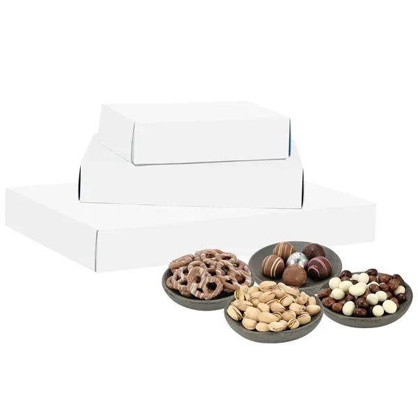 Box of pistachios, chocolate-covered pretzels, chocolate-covered raisins, and an assortment of... from ASI 71685 Midnite Snax®