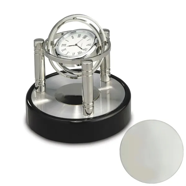 Quartz clock designed with gimbaled movement with silver posts, black piano... from ASI 68507 The Magnet Group / Benchmark Crystal & Clocks