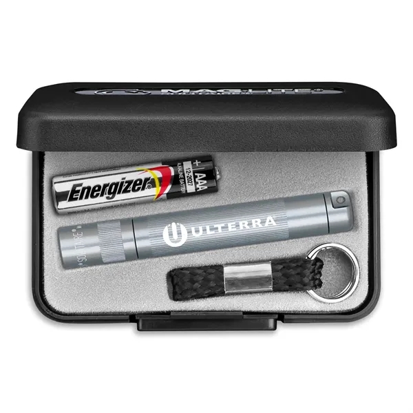 Mag-Lite flashlight with a keyring/lanyard attachment and one "AAA" battery.... from ASI 46170 Compass Industries Inc