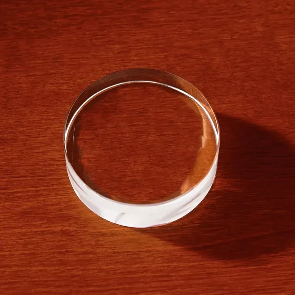 Crystal paperweight with circular shape and customization.... from ASI 68507 The Magnet Group / Benchmark Crystal & Clocks