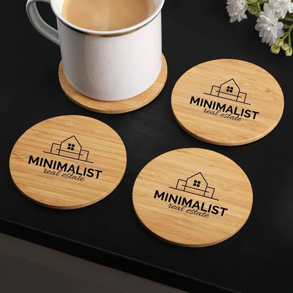 4-piece round bamboo coaster set packaged in a kraft box with... from ASI 61966 HPG / Beacon Promotions