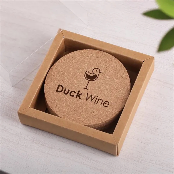 4-piece cork coaster set packaged in a kraft box with a... from ASI 61966 HPG / Beacon Promotions