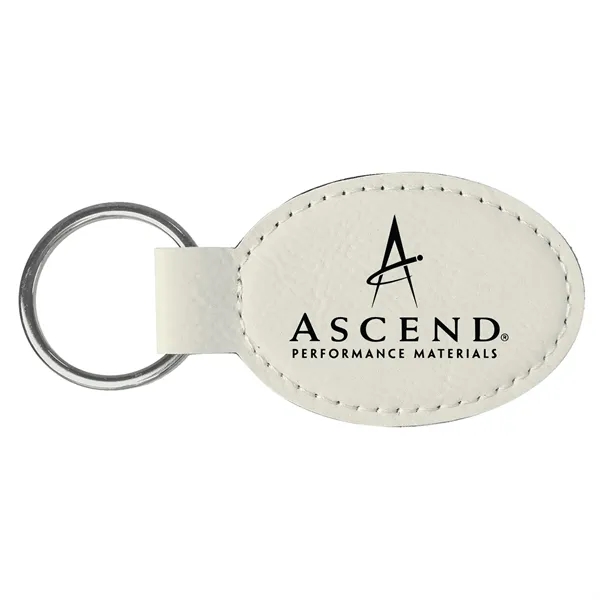 3" x 1 3/4" x 1/8" white PU leather oval keychain... from ASI 74601 Calico