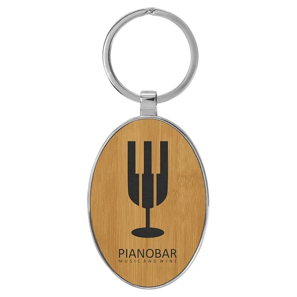 3" x 1 3/4" bamboo PU leatherette/metal oval keychain with metal... from ASI 74601 Calico