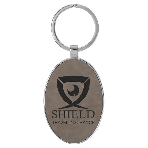 3" x 1 3/4" gray PU leatherette/metal oval keychain with metal... from ASI 74601 Calico