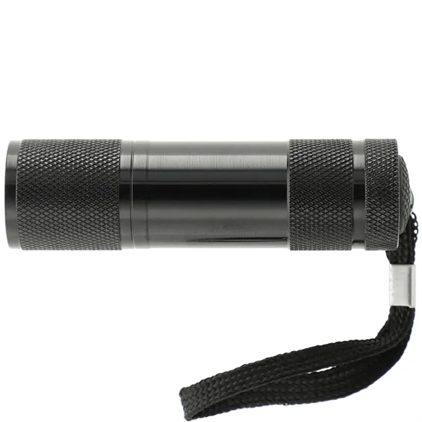 Flashlight with 9 LED lights, carry strap and batteries.... from ASI 66887 PCNA / Leeds