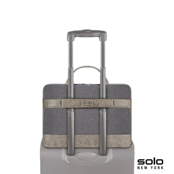 Solo Pilot two-tone slim brief; includes turquoise lining and protects laptops... from ASI 67866 Logomark/Valumark