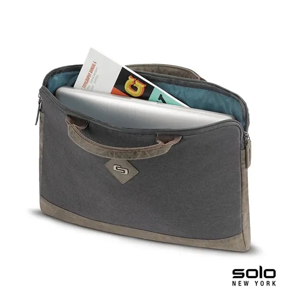 Solo Pilot two-tone slim brief; includes turquoise lining and protects laptops... from ASI 67866 Logomark/Valumark