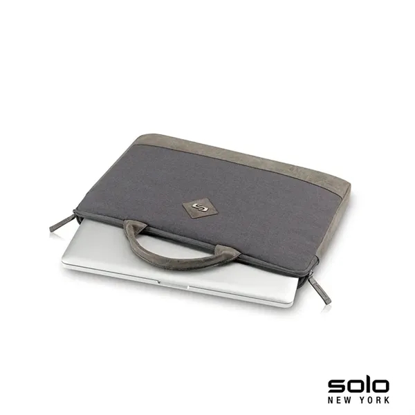Solo Pilot two-tone slim brief; includes turquoise lining and protects laptops... from ASI 67866 Logomark/Valumark