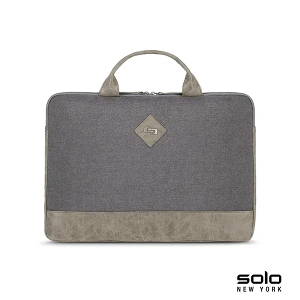 Solo Pilot two-tone slim brief; includes turquoise lining and protects laptops... from ASI 67866 Logomark/Valumark