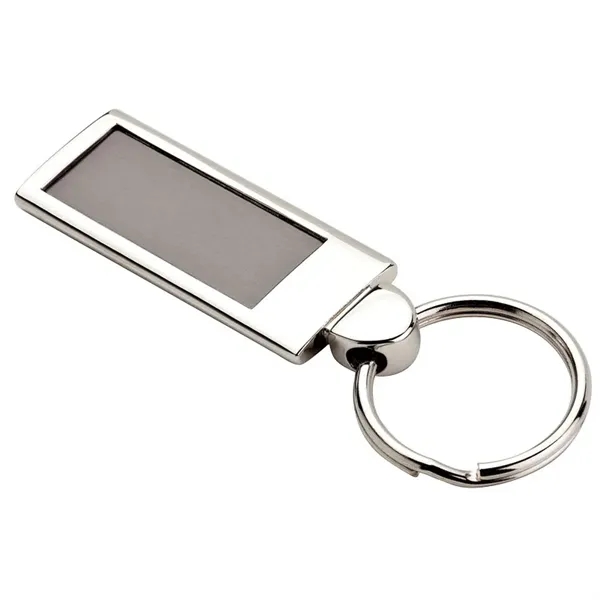 0.25" x 3.12" x 1.12" Doda aluminum tag-shaped keychain with nickel... from ASI 67866 Logomark/Valumark