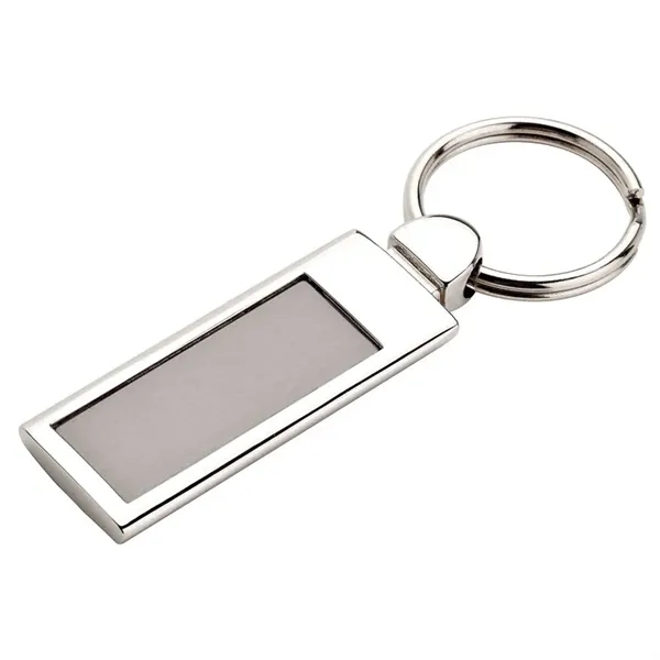 0.25" x 3.12" x 1.12" Doda aluminum tag-shaped keychain with nickel... from ASI 67866 Logomark/Valumark