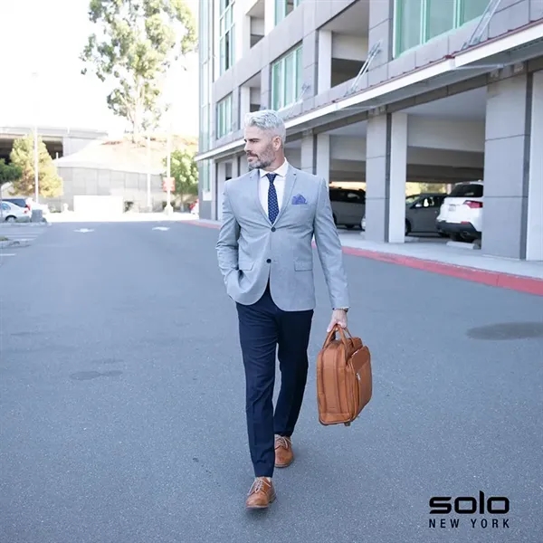 6.5" x 12.5" x 16.5" Solo® leather rolling trolley case with... from ASI 67866 Logomark/Valumark