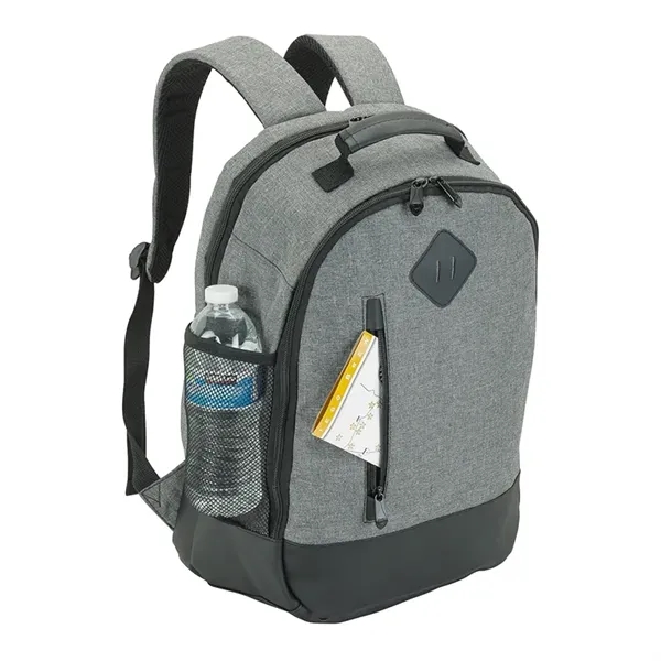 Backpack made with denim-feel fabric and leatherette trim.... from ASI 67866 Logomark/Valumark