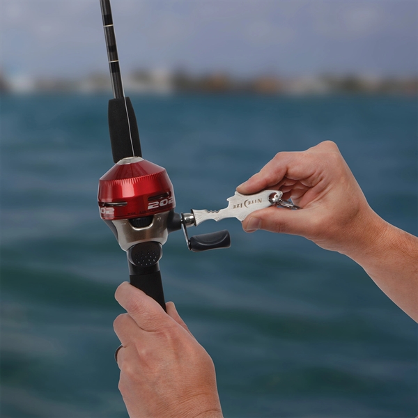 Fish-shaped stainless steel multi-tool featuring a flathead screwdriver, serrated edge, a... from ASI 46170 Compass Industries Inc