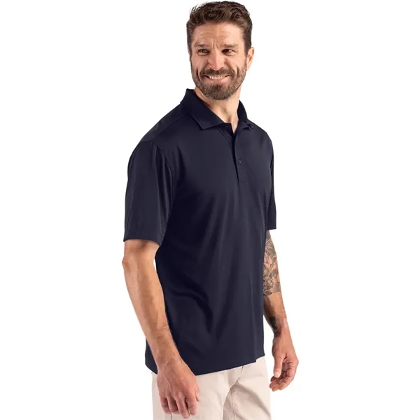 Men's polo with short sleeves, three-button placket, self-fabric neck trim, and... from ASI 47965 Cutter & Buck