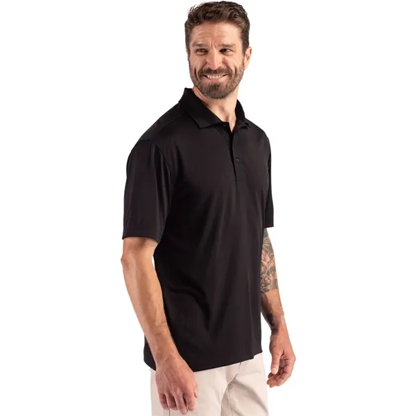 Men's polo with short sleeves, three-button placket, self-fabric neck trim, and... from ASI 47965 Cutter & Buck