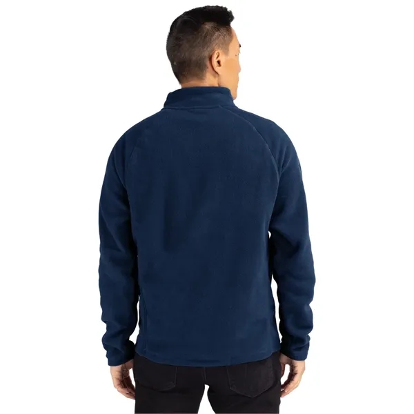 Men's jacket with a half-zip, self-fabric mock neck, two front zippered... from ASI 47965 Cutter & Buck