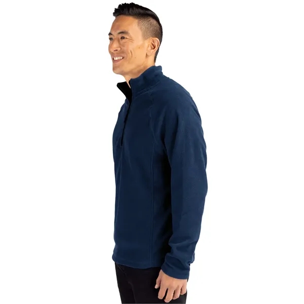 Men's jacket with a half-zip, self-fabric mock neck, two front zippered... from ASI 47965 Cutter & Buck