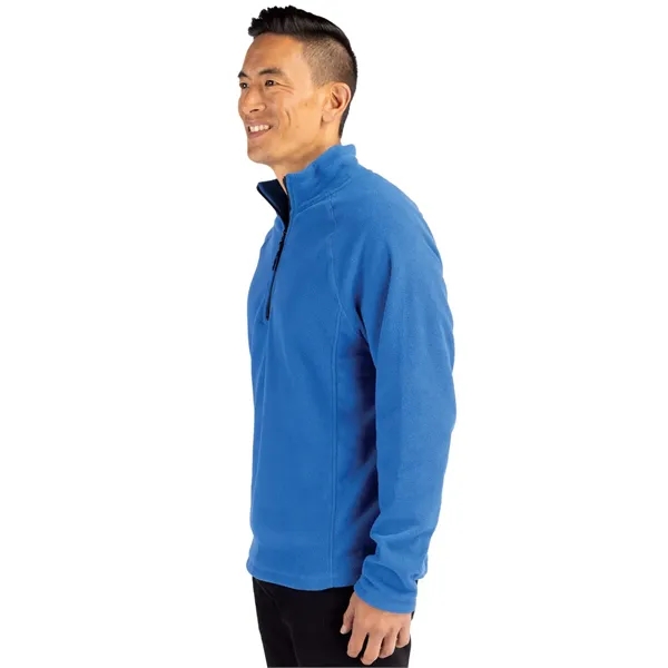 Men's jacket with a half-zip, self-fabric mock neck, two front zippered... from ASI 47965 Cutter & Buck