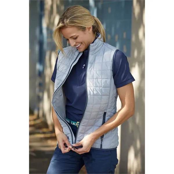 Women's puffer vest with insulation, wind and water resistance, pockets, and... from ASI 47965 Cutter & Buck