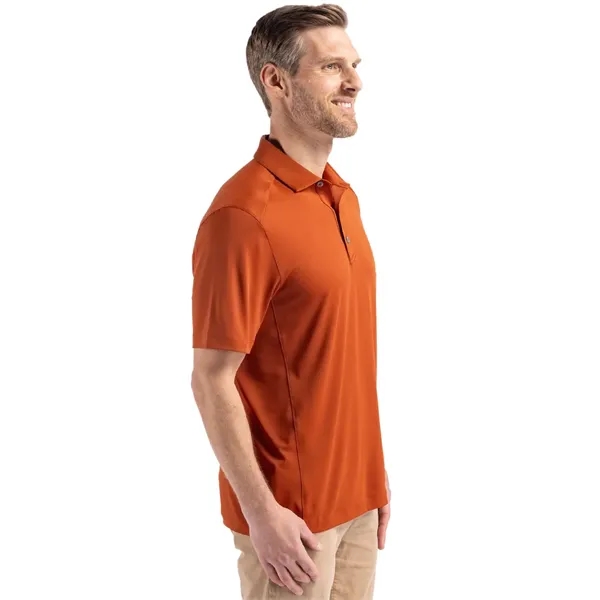 Men's polo with short sleeves, 4-way stretch, moisture-wicking performance, and UPF50+... from ASI 47965 Cutter & Buck