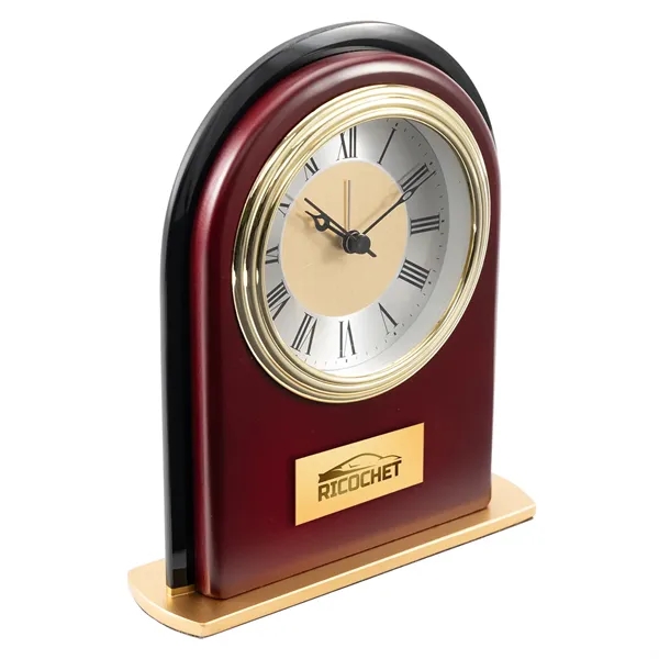 Arched rosewood clock with gold base, silver and gold dial and... from ASI 68507 The Magnet Group / Benchmark Crystal & Clocks
