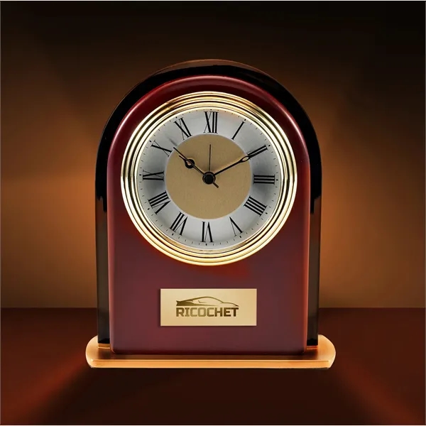 Arched rosewood clock with gold base, silver and gold dial and... from ASI 68507 The Magnet Group / Benchmark Crystal & Clocks