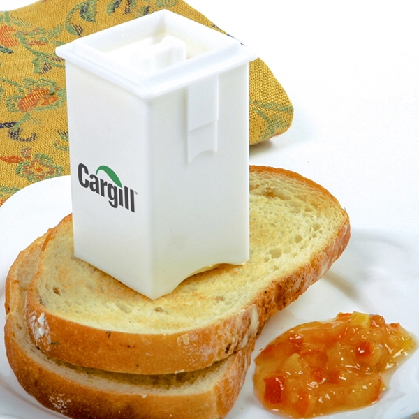 3" white spreader for butter that includes a cap to seal... from ASI 38120 Ball Pro / Diversified Quality Kitchenware