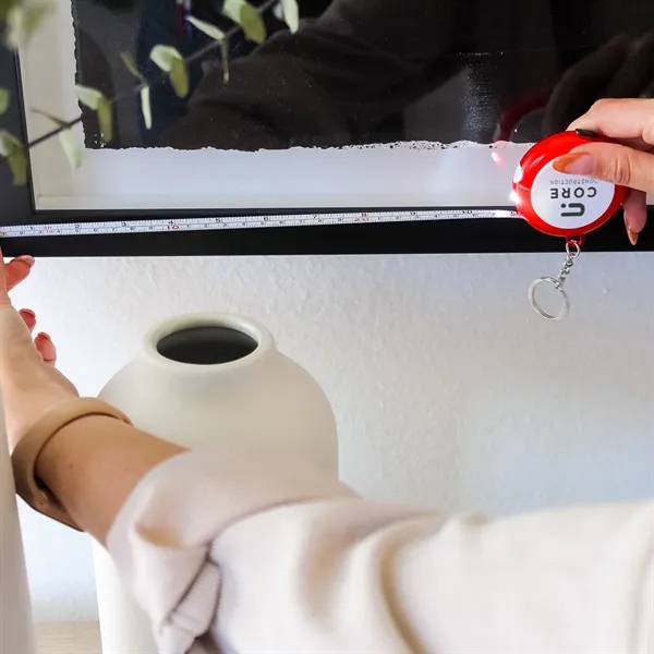 2.4" round plastic tape measure with 3' retractable tape, LED light... from ASI 61125 Hit Promotional Products / Hit®