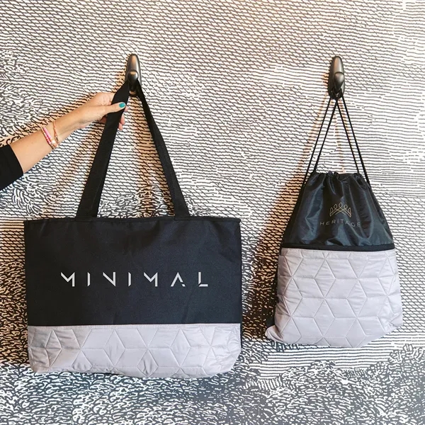 Quilted tote bag with large zippered compartment and 29" handles.... from ASI 61125 Hit Promotional Products / Hit®