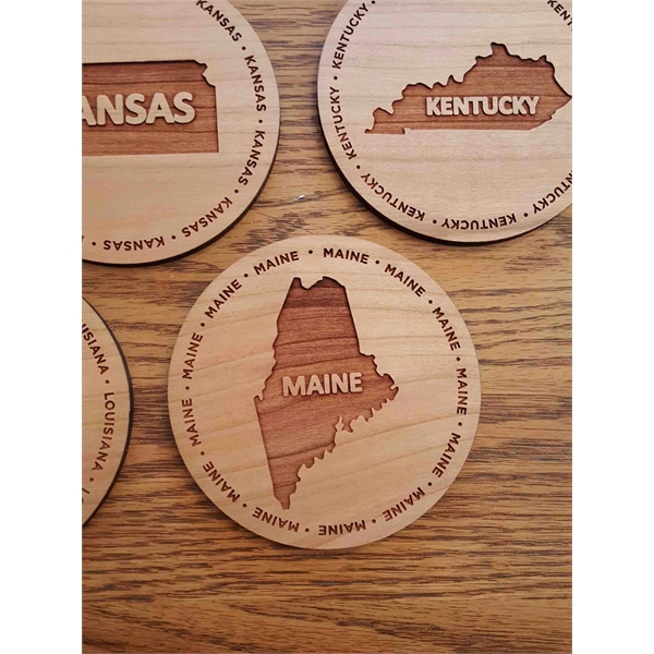 3.5" round wooden coasters with State of Maine shape in the... from ASI 92531 Unique Custom Products / UCP