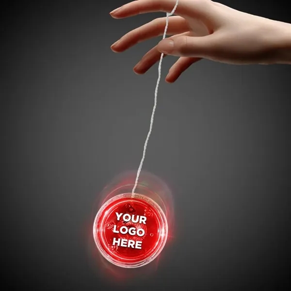 2 3/8" red and clear yo-yo with red LED lights.... from ASI 42016 Brighter Promotions Inc / Chemical Light™