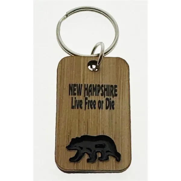 2-layer rectangular keychain with soft enamel bear, moose, or heart designs.... from ASI 40610 Perry Blackburne Inc