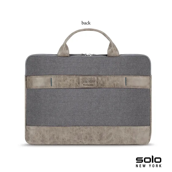 Solo Pilot two-tone slim brief; includes turquoise lining and protects laptops... from ASI 67866 Logomark/Valumark